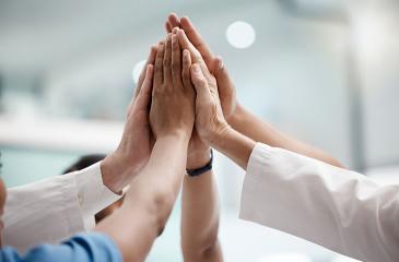 High five, teamwork and doctors hands in collaboration for mission, goal or team building together.