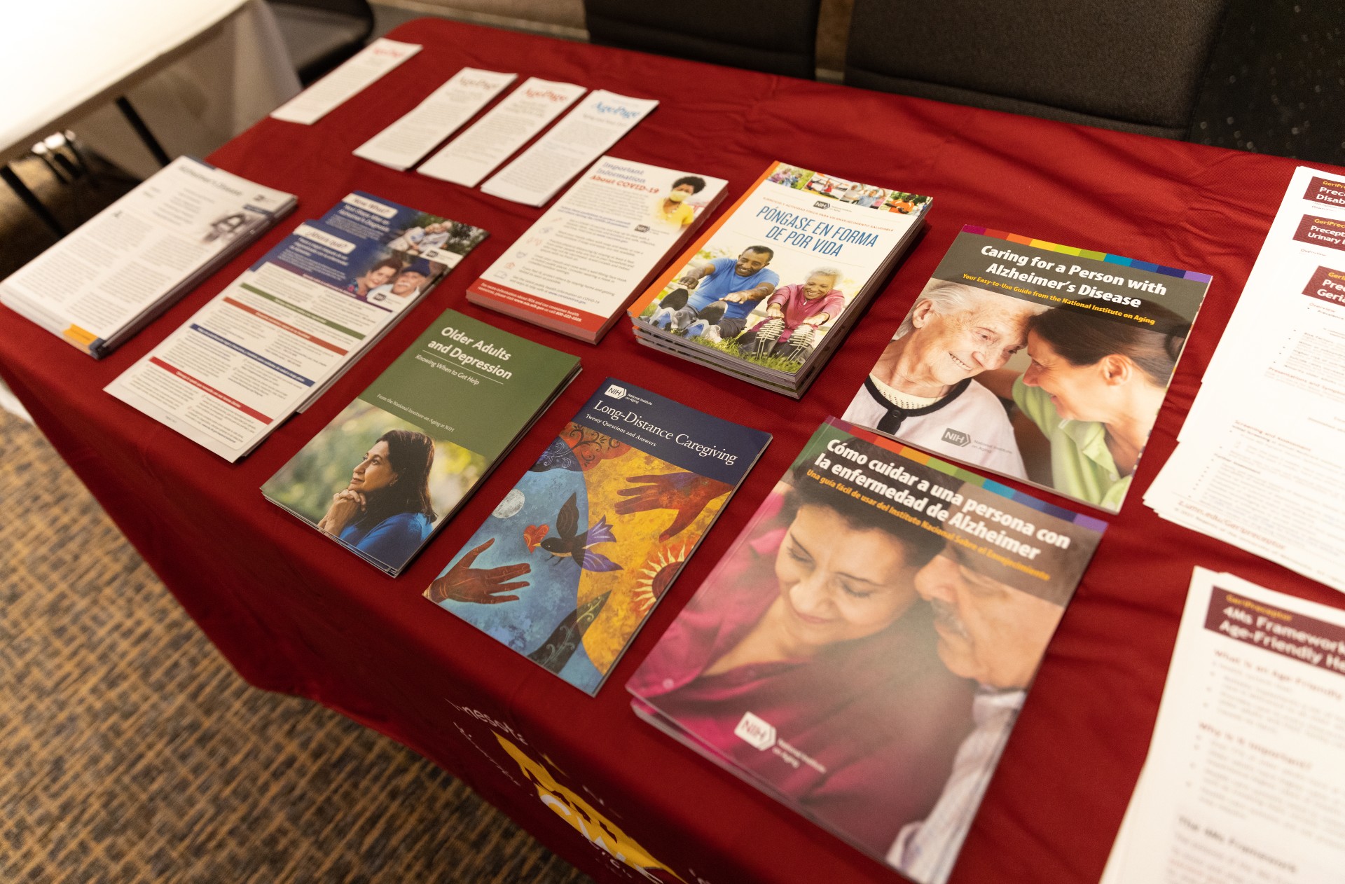 Pamphlets on table featuring different caregiving topics