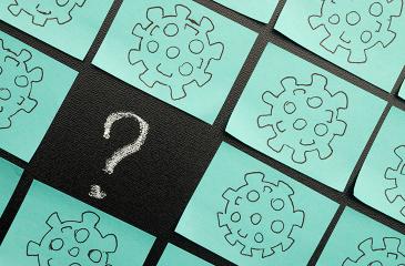 virus illustrations and a question mark