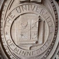 University of Minnesot seal on wall