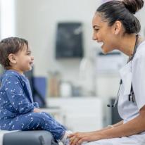 child with health care provider