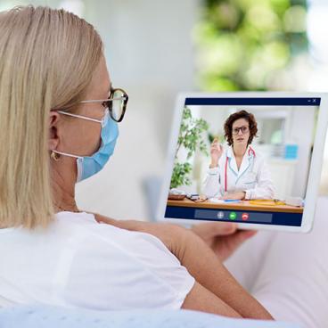 patient and doctor on telehealth visit on tablet computer